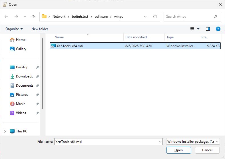 The Open dialog box showing the XenTools-x64.msi file, stored in a network share \\tudinh.test\software\winpv.