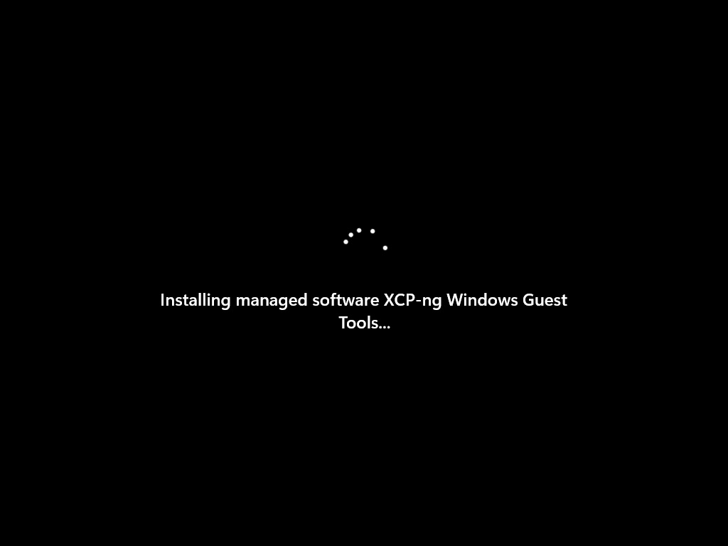 The Windows bootup showing "Installing managed software XCP-ng Windows Guest Tools…".